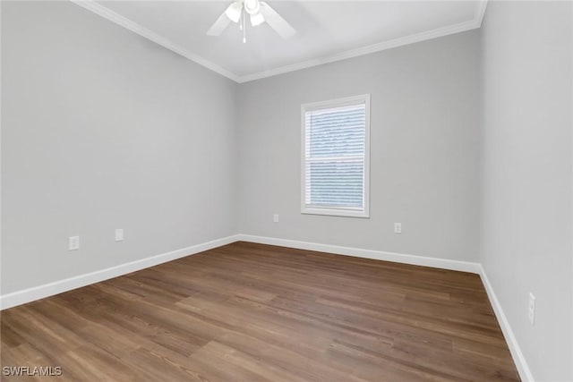 unfurnished room with ceiling fan, crown molding, baseboards, and wood finished floors