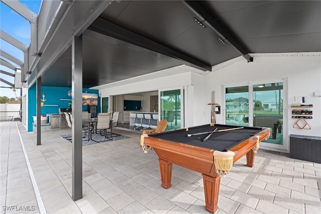 rec room featuring vaulted ceiling with beams, tile patterned floors, and pool table