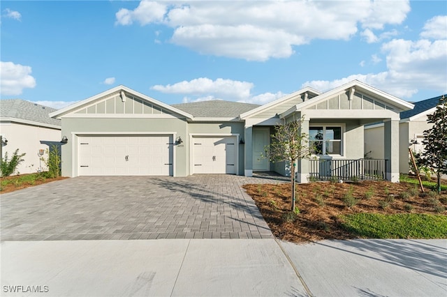 view of front of property featuring a garage