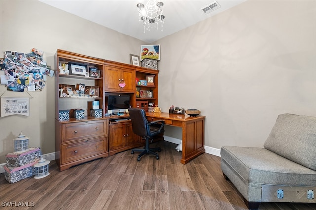 office featuring dark hardwood / wood-style flooring and a notable chandelier