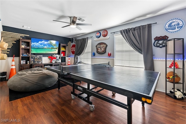 rec room with ceiling fan and dark hardwood / wood-style floors