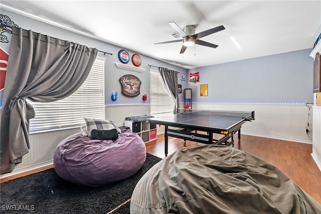 interior space featuring hardwood / wood-style flooring and ceiling fan