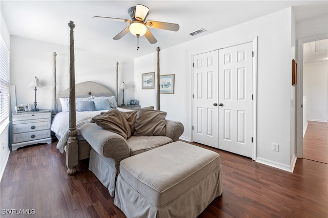 bedroom featuring ceiling fan, a closet, and dark hardwood / wood-style floors