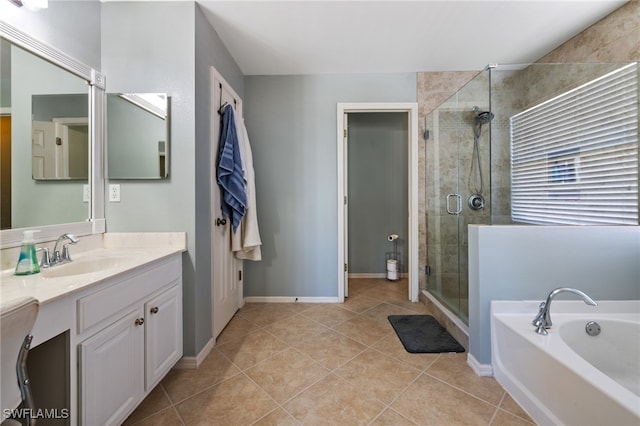 bathroom featuring tile patterned floors, vanity, and plus walk in shower