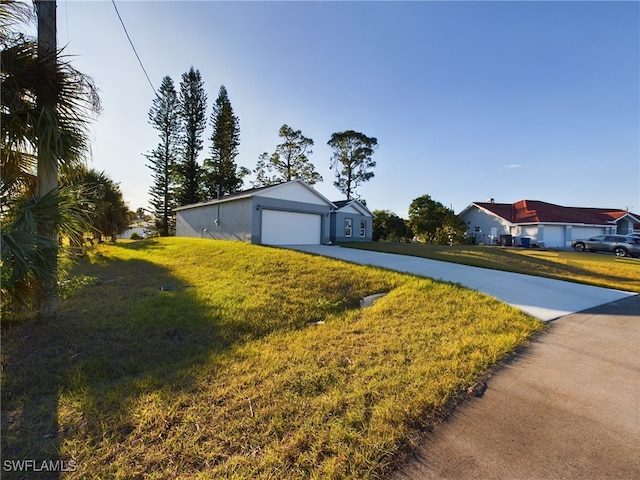 view of yard featuring a garage