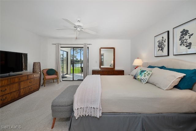 bedroom featuring ceiling fan, light colored carpet, and access to outside