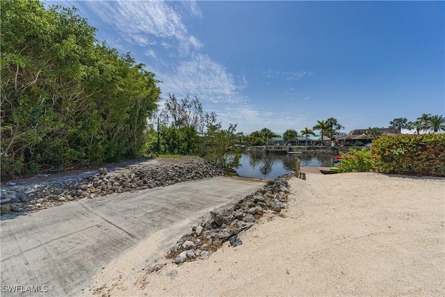 view of water feature with a dock