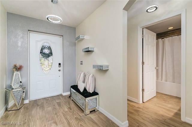 entrance foyer with light hardwood / wood-style floors