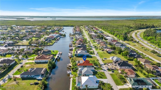 drone / aerial view featuring a water view