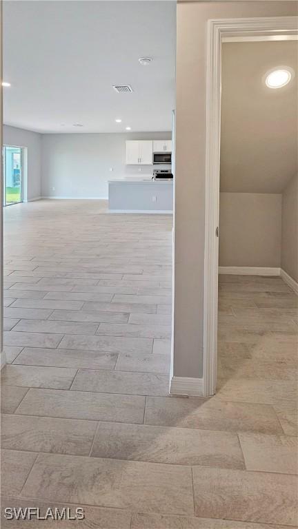 hallway featuring light hardwood / wood-style floors