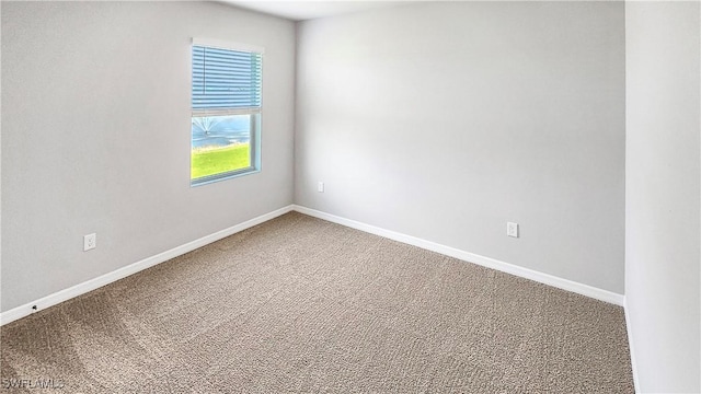 empty room featuring carpet flooring