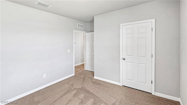 unfurnished bedroom featuring carpet flooring