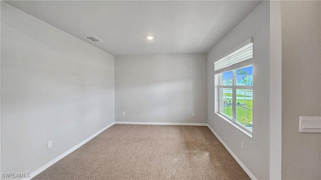 empty room featuring carpet