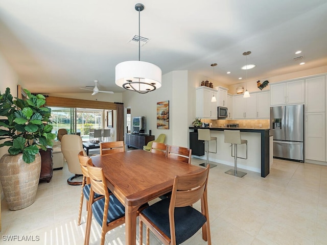 dining area featuring ceiling fan