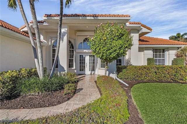 view of front facade featuring french doors