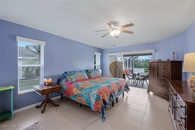 bedroom featuring ceiling fan and light tile patterned flooring