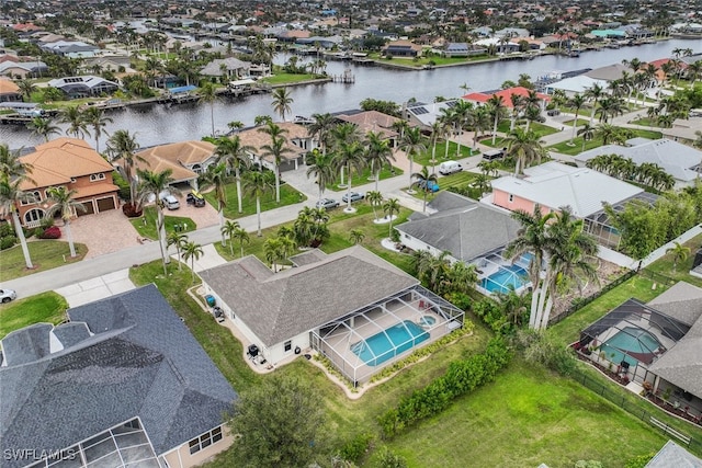 drone / aerial view featuring a water view