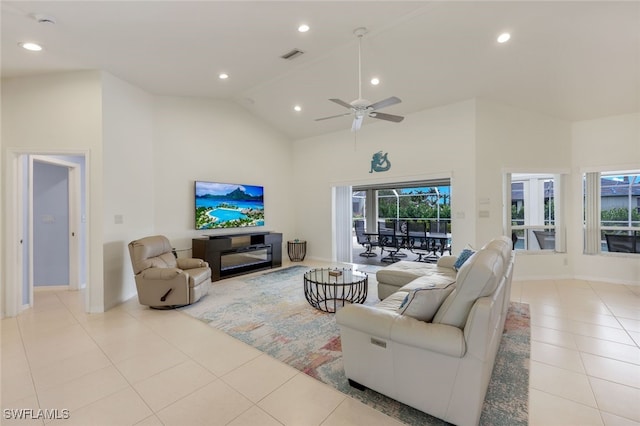 tiled living room featuring high vaulted ceiling and ceiling fan