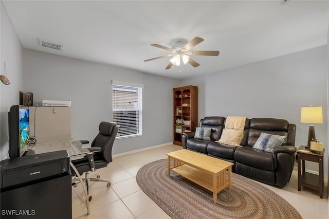 office with ceiling fan and light tile patterned flooring