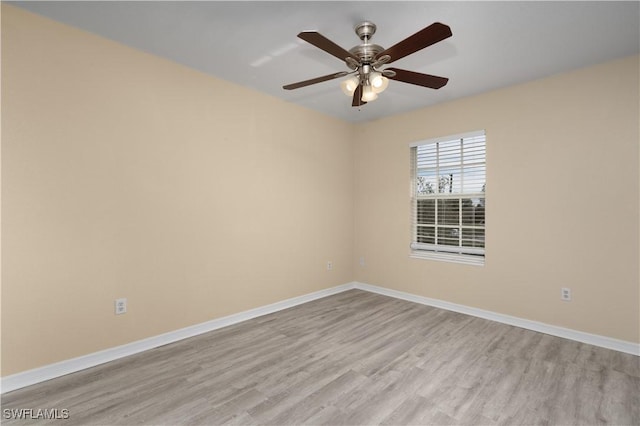 unfurnished room with light hardwood / wood-style flooring and ceiling fan