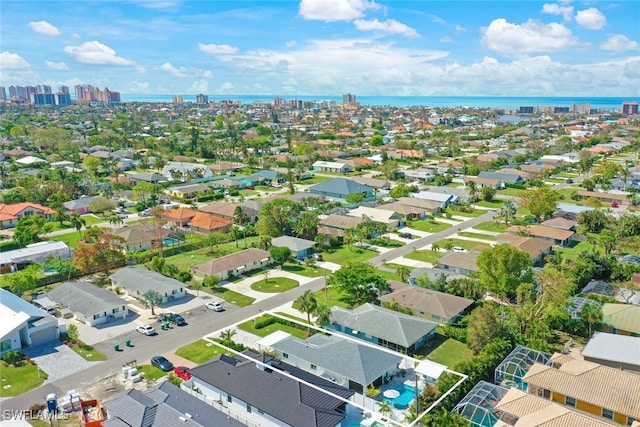 bird's eye view with a water view