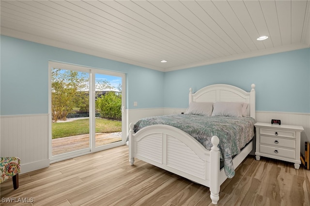 bedroom with access to outside, light hardwood / wood-style flooring, and wood ceiling