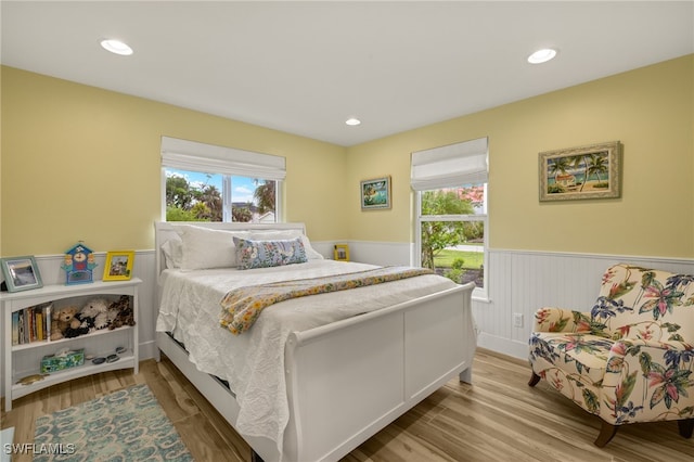 bedroom with light wood-type flooring