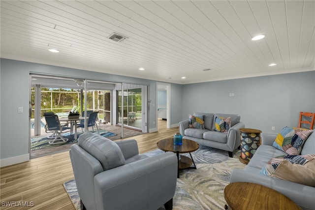 living room with light hardwood / wood-style flooring, wood ceiling, and ornamental molding