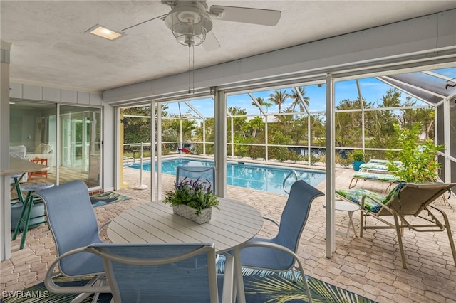 view of swimming pool with ceiling fan