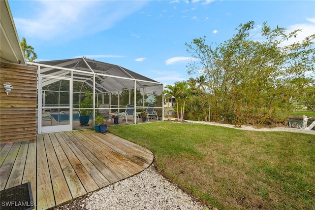 view of yard featuring glass enclosure