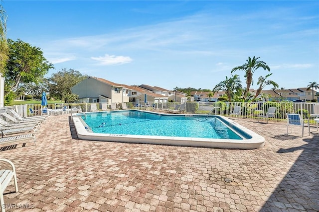 view of swimming pool featuring a patio