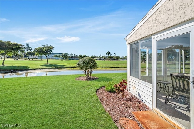 view of yard featuring a water view