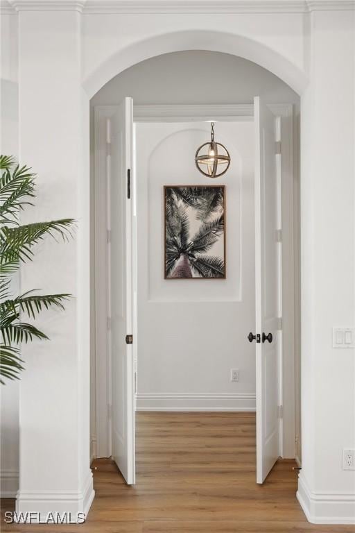 corridor featuring light hardwood / wood-style floors