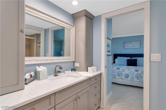 bathroom featuring tile patterned floors and vanity