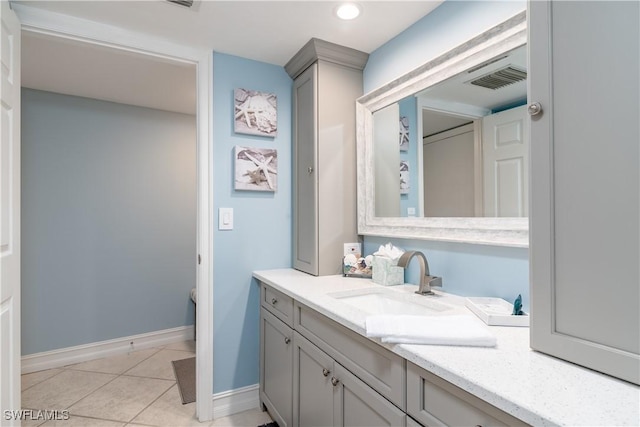 bathroom featuring tile patterned floors and vanity