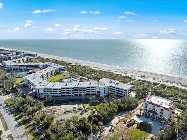 aerial view featuring a water view and a view of the beach