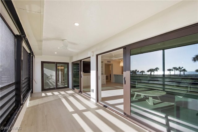 interior space featuring ceiling fan