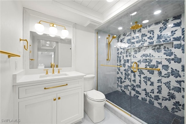 bathroom featuring tile patterned flooring, vanity, toilet, and walk in shower