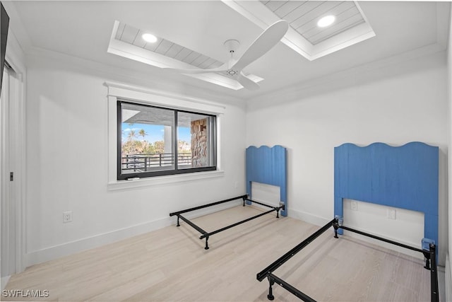 bedroom featuring ceiling fan, crown molding, and wood-type flooring