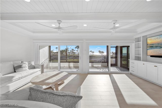 living room featuring beam ceiling, built in features, wooden ceiling, and light hardwood / wood-style flooring