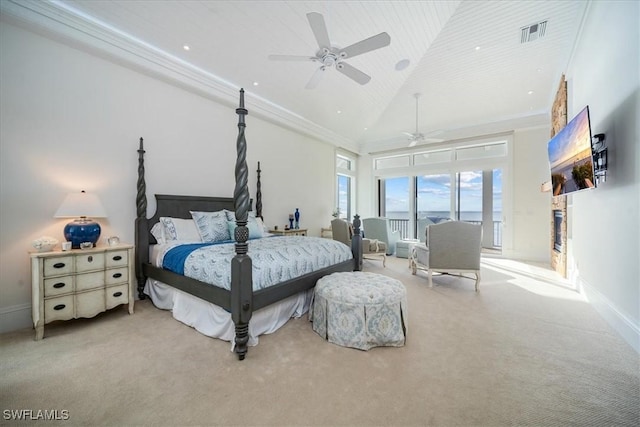 carpeted bedroom with crown molding, high vaulted ceiling, and ceiling fan