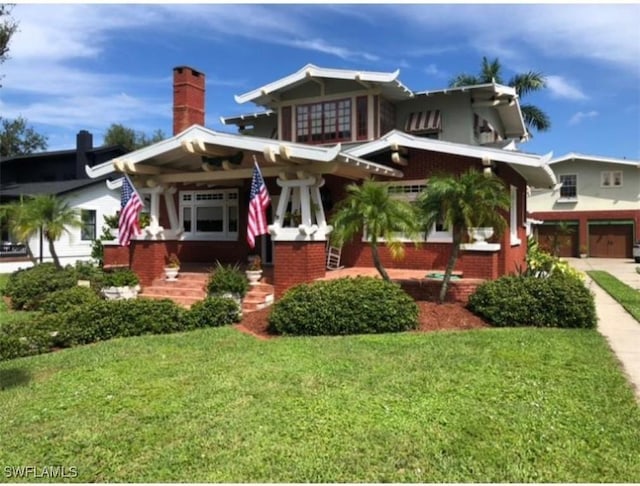 view of front of property with a front lawn