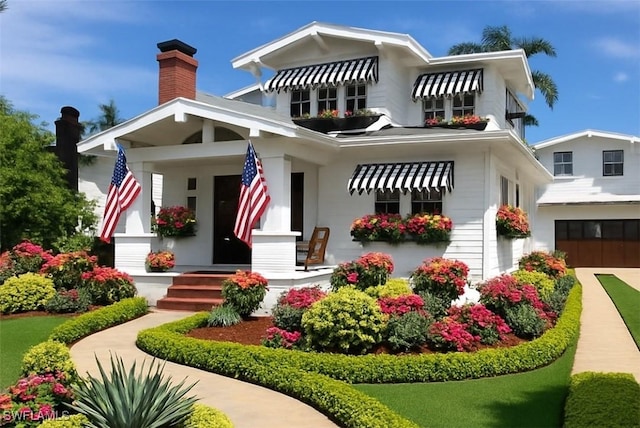 1249 Osceola Dr, Fort Myers, FL 33901 - view of front of property featuring a chimney and covered porch