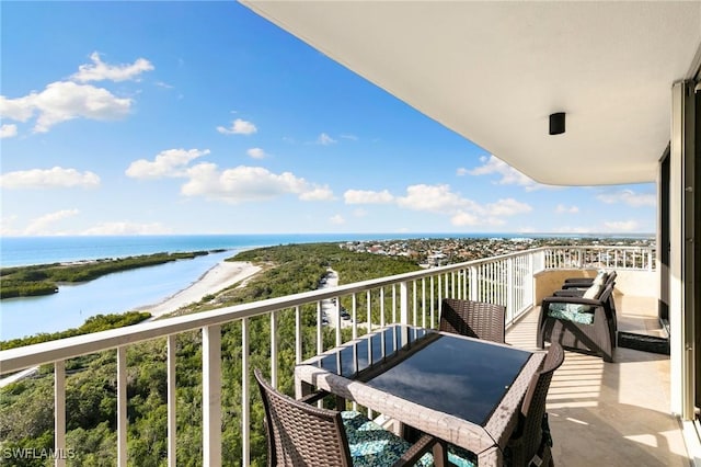 balcony featuring a water view