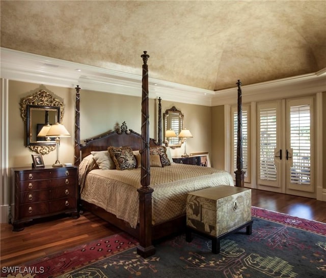 bedroom featuring access to outside, crown molding, french doors, and dark hardwood / wood-style floors