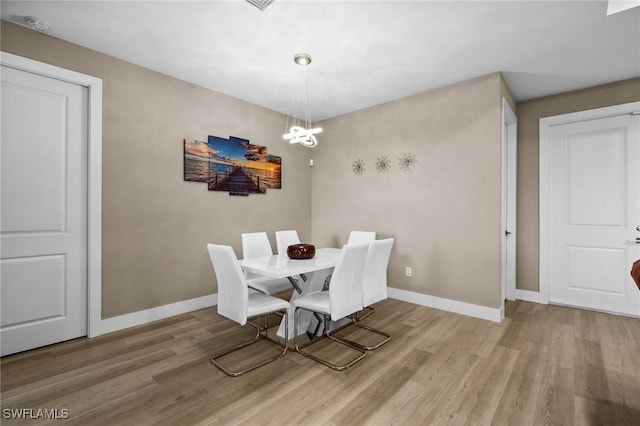 dining area featuring light hardwood / wood-style floors