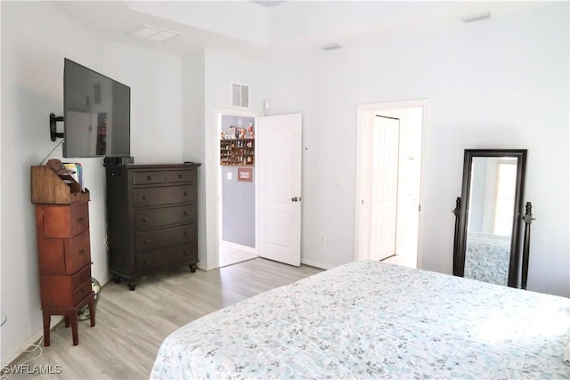 bedroom with light hardwood / wood-style flooring