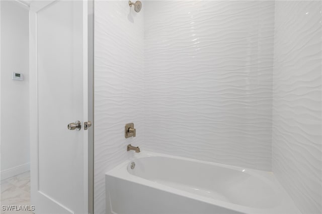 bathroom featuring washtub / shower combination