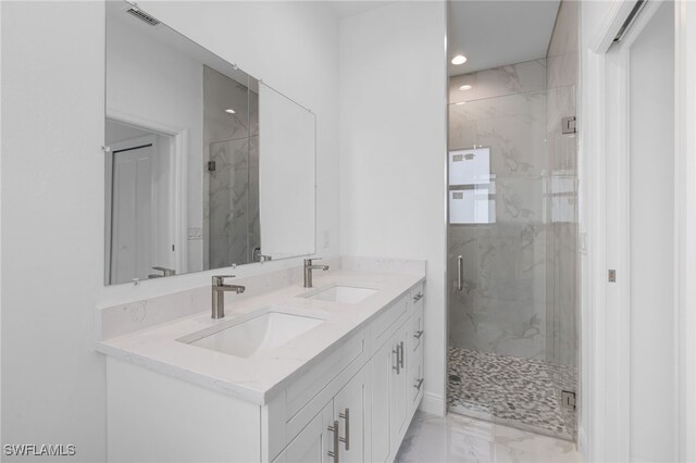 bathroom featuring vanity and walk in shower