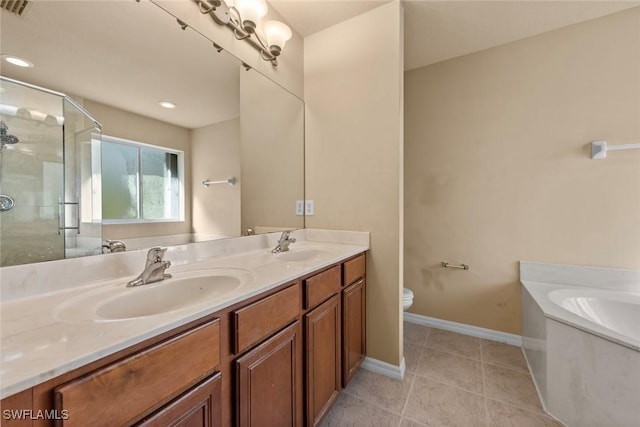 full bathroom featuring tile patterned flooring, shower with separate bathtub, vanity, and toilet